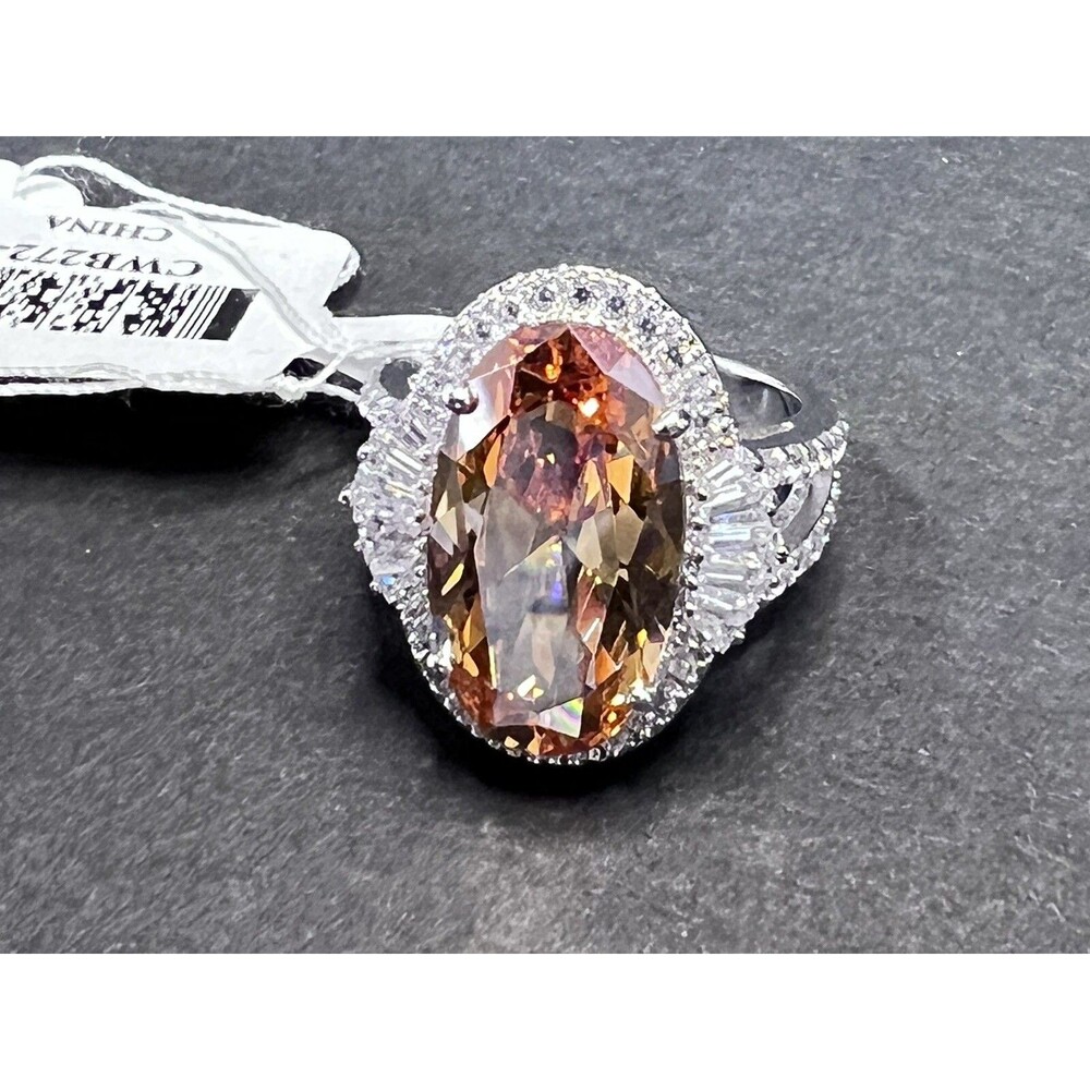 Bella Luce Champagne Simulated Diamond 13.00CT Oval Ring Rhodium Plated